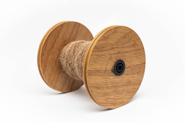 istock Wooden Yarn bobbin. 2190092174