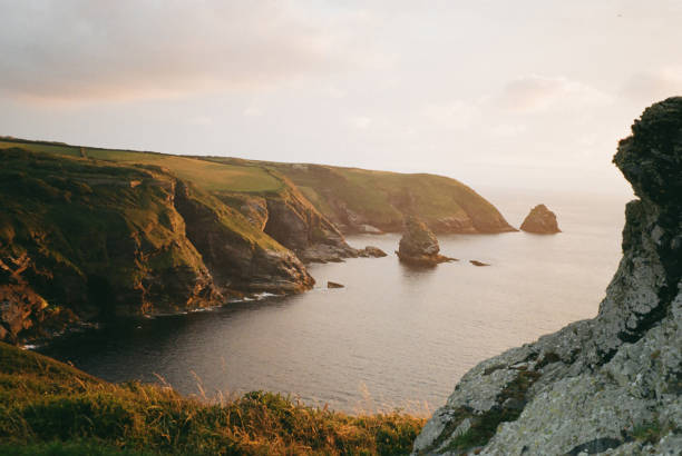 Sunset on the cliffs facing the sea in Boscastle, Cornwall.