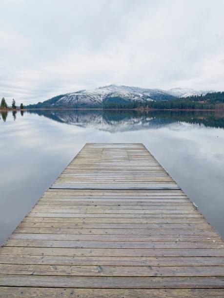 Looking out from the dock at the calm Rose Lake in north Idaho.