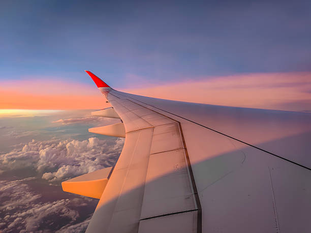 istock The view from the airplane window to the clouds and sunset during a flight 2190103365