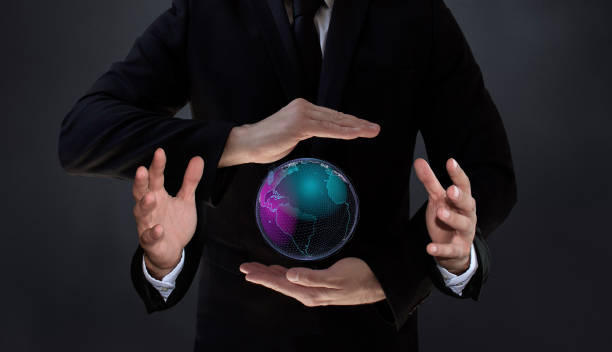 The World Controlled by New Artificial Intelligence Technology Humans who manage AI-based systems will have more control over the world. An AI-powered scientist holding a spinning world in his four hands. / You can see the animation movie of this image from my iStock video portfolio. Video number: 2190030585 finger spinning globe stock pictures, royalty-free photos & images