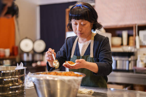 istock Filling Korean dumplings with rice noodles. 2190116175