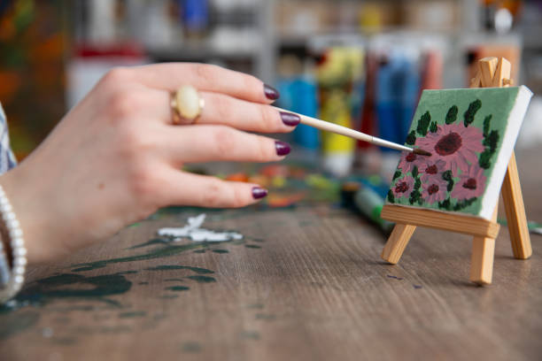 istock Creating a Beautiful Artistic HandPainted Floral Scene on a Mini Canvas, Step by Step 2190116857