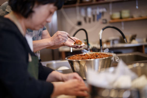 istock Filling Korean dumplings with rice noodles. 2190117723