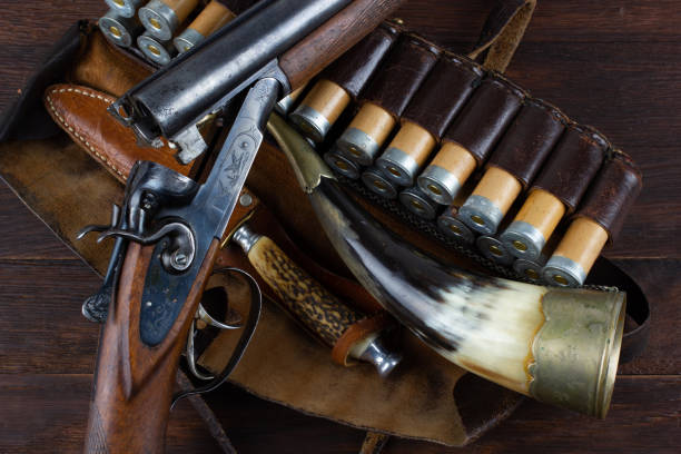 istock double barreled side shotgun with cartridges in bandolier. 2190117855