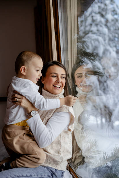 Mother playing with kids stock photo