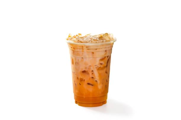 Ready for drink Ice Thai tea milk serving on white background in isolated concept.