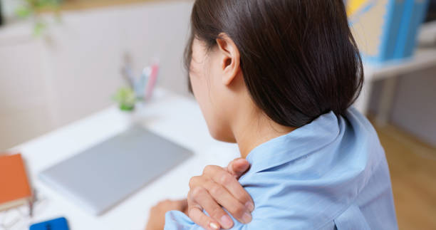 istock woman has shoulder back pain 2190129903