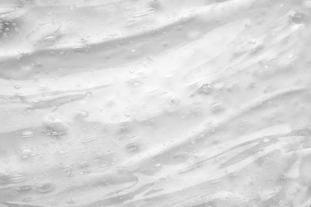 istock Transparent clear liquid serum gel cosmetic texture background 2190131948