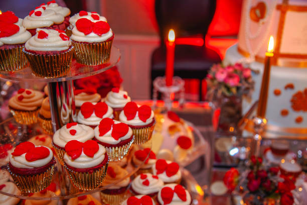 istock Luxurious Dessert Table with a Romantic Red and Gold Theme for Celebrations 2190136915