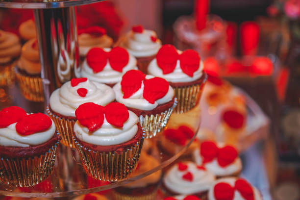 istock Luxurious Dessert Table with a Romantic Red and Gold Theme for Celebrations 2190136919
