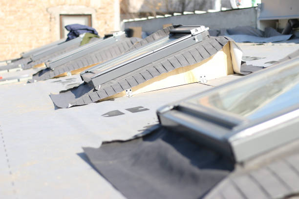 istock New roof with skylight windows in mansard garret, or attic. 2190137606
