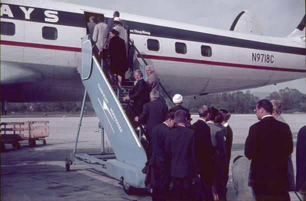 Klagenfurt am Wörthersee, Carinthia, Austria, 1965. Passengers from Berlin board a commercial airliner via a gangway.