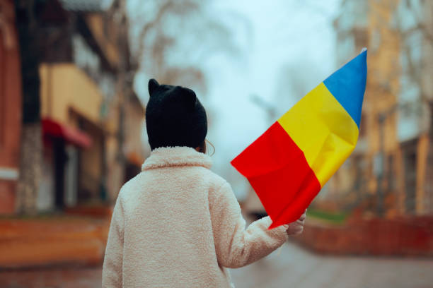 istock Child Holding a Flag Celebrating Romania 2190149053