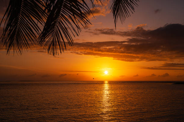 istock Twilight background of sunset over the tropical ocean 2190150895