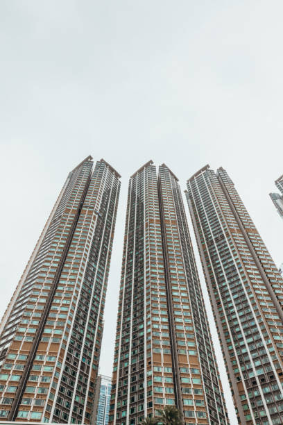 istock Modern Skyscrapers Against Cloudy Sky 2190153148