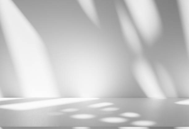 istock Wall interior background, studio and backdrops show products.with shadow from window color white . background for text insertion and presentation product 2190157952