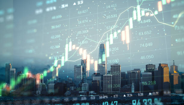 istock Financial data graphs overlay a city skyline with focus on San Francisco's skyscrapers, symbolizing economic growth and market trends. 2190159071