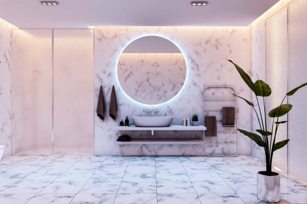istock Modern elegant bathroom interior with marble flooring, round backlit mirror, sleek vanity, and stylish decor in soft lighting. 3D Rendering 2190159148