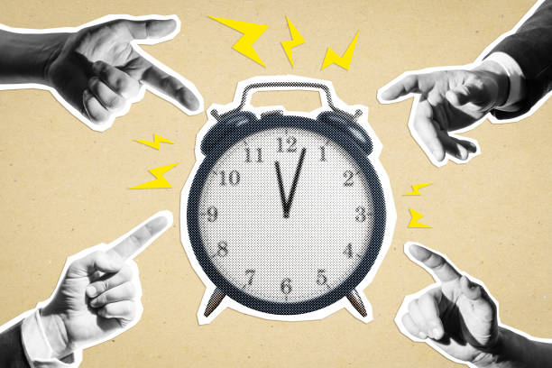 istock Clock surrounded by pointing hands on textured background, representing time management and urgency concept in business. 2190159237
