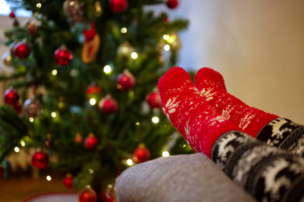 istock Female legs in Christmas stockings 2190164169