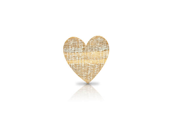 Abstraction of a nest of love. White heart wrapped in a rope in a basket as a token of love and greetings on Valentine's Day. Patterned background.