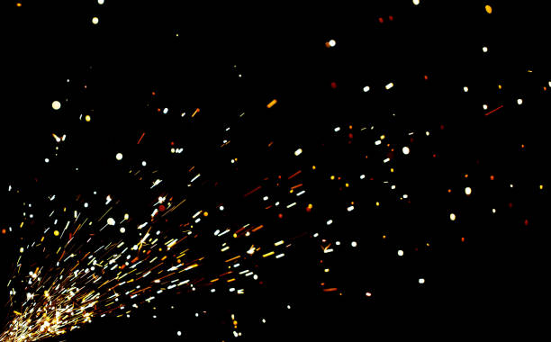 istock A black background with a lot of sparks and fire 2190168584