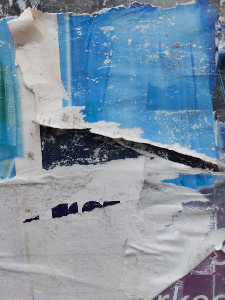 istock Ripped street poster background, weathered torn paper backdrop 2190169404