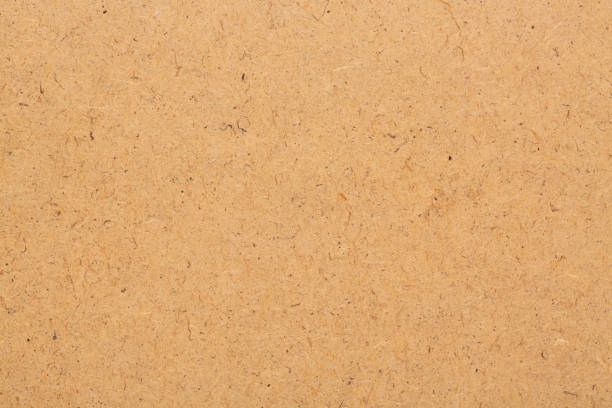 istock Close up recycle cardboard or brown board kraft paper box texture background. Paperboard, cardboard or carton texture 2190169953