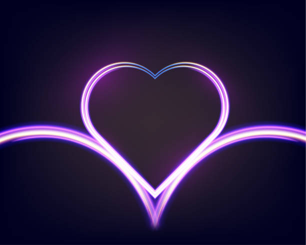 istock Glowing neon heart with vibrant pink and blue lights on background. 2190170509