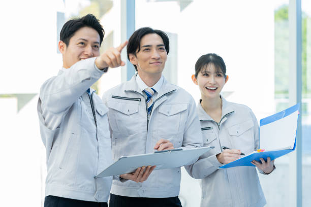 istock Businessmen in work clothes having a meeting 2190172782
