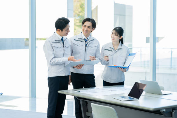 istock Businessmen in work clothes having a meeting 2190172783