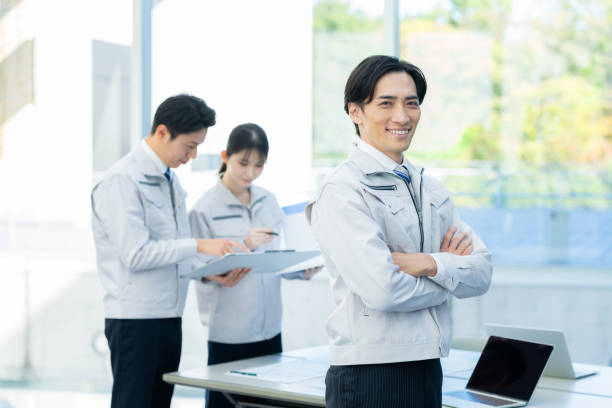 istock Businessmen in work clothes having a meeting 2190172784