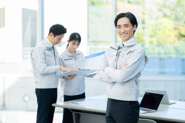 istock Businessmen in work clothes having a meeting 2190172792