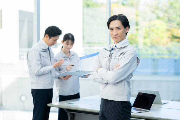 istock Businessmen in work clothes having a meeting 2190172798