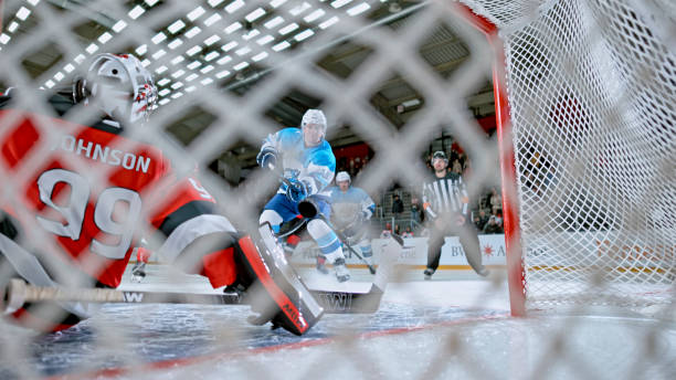 istock Behind the Net: Ice Hockey Goal Attempt 2190174573