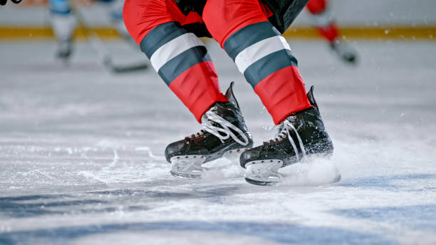 istock Dynamic Close-Up: Ice Hockey Skates Cutting the Ice 2190174778