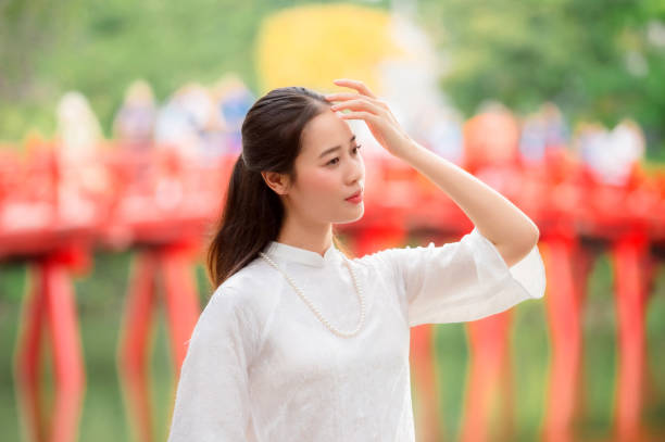 istock Vietnamese woman and landmark 2190176107