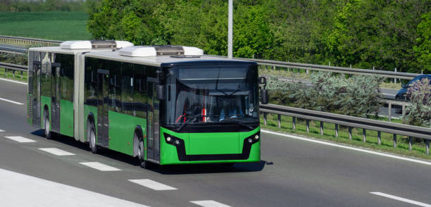 istock Green bus on the road. 2190181444