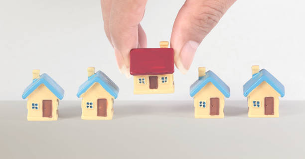 istock House Model Small size there space Residential Structure, home Business Concepts, and Success in Finance, Banking and Investment 2190184866