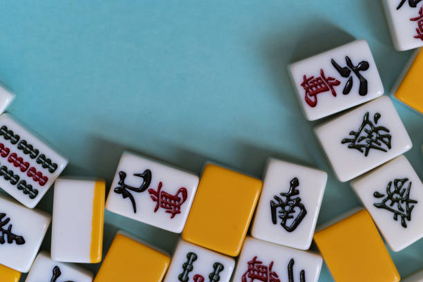 istock Mahjong tiles lined up on a blue background 2190185767