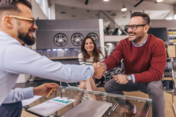 istock Congratulations, we have a deal about buying a car! 2190191761