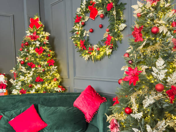 istock Decorated Christmas tree with decorations, gifts and lights at home 2190193137