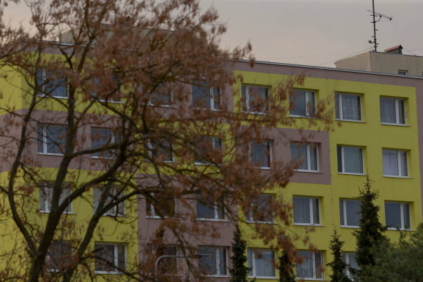 istock A beautiful yellow and pink apartment building surrounded by trees 2190194610