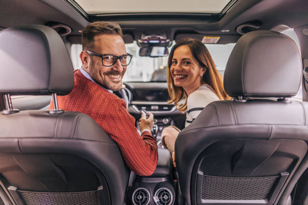 istock A beautiful couple buying a new car 2190194942