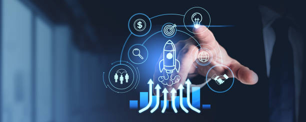 istock Man finger touch glowing startup hologram, lightbulb and icons. Copy space 2190202204