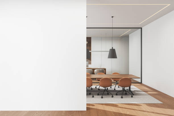 istock Modern office interior with wooden table and chairs, workplace and mockup wall 2190202252