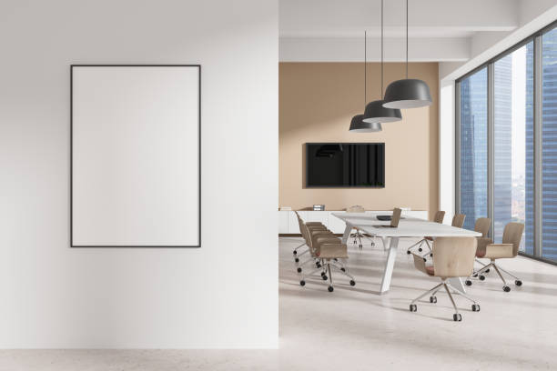 istock Modern office interior with blank poster on wall and city view. 3D Rendering 2190202731