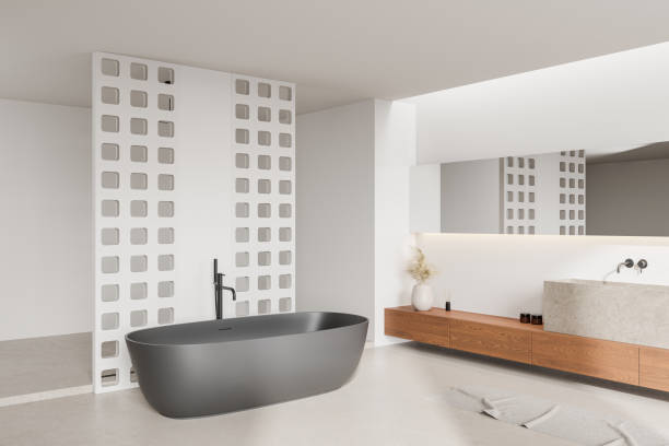 istock Modern bathroom with a freestanding tub and minimalist decor. 3D Rendering 2190203115