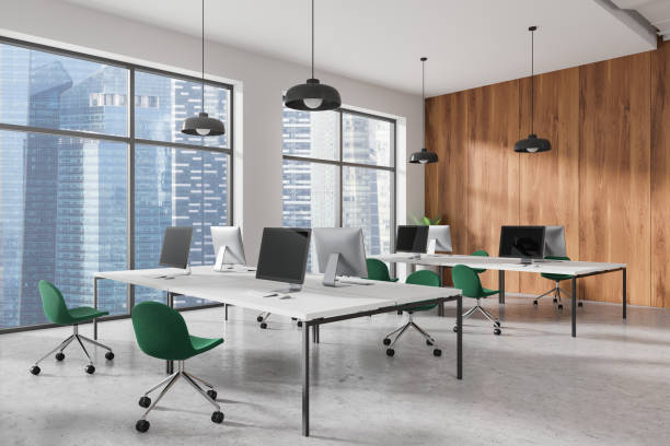 istock Modern coworking office space with city view windows and wooden wall. 3D Rendering 2190204247